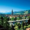 Of all Swiss cities  BERN  Berne in French  is perhaps the most immediately charming  Crammed onto a steep sided peninsula in a crook of the fast flowing River Aare