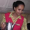 So my story is biased and subjective  showing the best of Eritrea  as I would like to remember it and show it to the rest of the world  Woyane  if you don t like it  don t read it  Flight attendant Helen serving coffee on the flight to Asmara