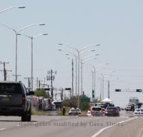 <p>Albuquerque police cordon off an intersection near solar and fiber optic manufacturer Emcore Corp  in Albuquerque  N M   on Monday  July 12  2010  Police said a man entered the building and shot nine people  five of whom died  Police said the gunman was found dead inside the building of a self inflicted gunshot wound  < p>
