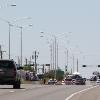 <p>Albuquerque police cordon off an intersection near solar and fiber optic manufacturer Emcore Corp  in Albuquerque  N M   on Monday  July 12  2010  Police said a man entered the building and shot nine people  five of whom died  Police said the gunman was found dead inside the building of a self inflicted gunshot wound  < p>