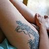 Wake up girls  Here s the dragon that never sleeps  Erotic dragon tattoo on the girl s thigh is amazing and looks appealing  Skinned in the black ink with detailed