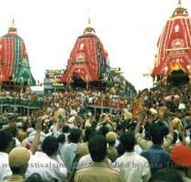 Jagannath  Subhadra  Balbhadra are decorated in procession  very big three chariots are there with ropes and the huge then the chariots are pulled by millions millions of devotees in orissa