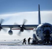 Posted 5 4 2006 ADMUNSEN SCOTT SOUTH POLE STATION  Antarctica    An Air National Guard LC 130H Hercules sits while crews unload fuel and cargo here during a recent mission  The LC 130H is