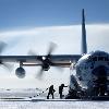 Posted 5 4 2006 ADMUNSEN SCOTT SOUTH POLE STATION  Antarctica    An Air National Guard LC 130H Hercules sits while crews unload fuel and cargo here during a recent mission  The LC 130H is