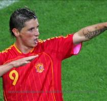 Photo Gallery 19 Jun 2006 A winner s pose Spanish forward Fernando Torres celebrates after scoring the go ahead goal during the opening round Group H World Cup football match between Spain and Tunisia at Stuttgart s