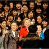 an auditorium at Ewha Womans University in Seoul to hear Mrs  Clinton deliver a speech that ranged from North Korea s nuclear threat to the challenge women face in balancing work and family  Another standing room only crowd at the University of Tokyo listened to Mrs  Clinton discuss how the United States should rebuild its ties to the Muslim world  Toward the end  a nervous young