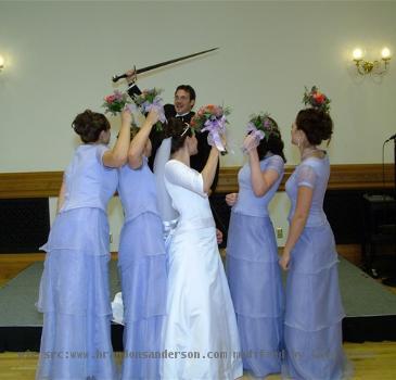 I believe those two expressions to be a metaphor for how our marriage is likely to go        And  for some reason  they didn t like me hopping into their pictures  Go figure  Good news is  I caught the bouquet  Five of them  Click on any of the pictures to get a close up