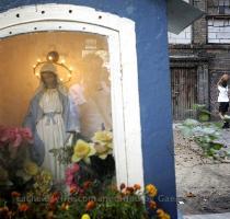 Getty Images 40 months ago WARSAW  POLAND   SEPTEMBER 30  A young boy plays basket ball next to a catholic shrine in a courtyard