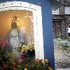 Getty Images 40 months ago WARSAW  POLAND   SEPTEMBER 30  A young boy plays basket ball next to a catholic shrine in a courtyard