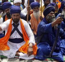 Reuters Pictures 18 months ago Nihangs  or Sikh warriors  hold their swords during a sit in protest against the Dera Sacha Sauda