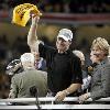 Steelers coach Bill Cowher  with his wife Kaye  waves his  terrible towel  in his victory celebration