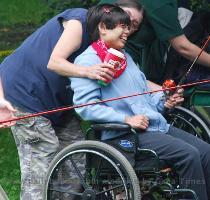 News FARMINGTON   Mandy Manning shares a laugh with Charlene Corbett of LEAP  Inc  as her line is cast in the First Annual Fishing Derby for Adults with Developmental Disabilities held at Rollo