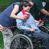 News FARMINGTON   Mandy Manning shares a laugh with Charlene Corbett of LEAP  Inc  as her line is cast in the First Annual Fishing Derby for Adults with Developmental Disabilities held at Rollo