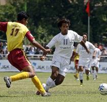 Reuters Pictures 10 months ago 09YMdk97MYefT Ishfaq Ahmad  R  of Jammu   Kashmir team and Ramesh Kumar  L  of Himachal Pradesh team fight for the ball during the 62nd National Football Championship