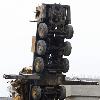 Reuters Pictures 2 months ago Delhi Metro Rail Corporation  DMRC  workers sit on a tractor in front of an overturned crane