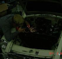 John working on finding the oil leak on Mr  Johnson s MGB