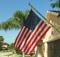 I have seen HOA s allow flags to be displayed like this  But not like this