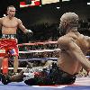 AP Photo Jae C  Hong A view from below  Joel Casamayor  right  found himself looking up moments before being stopped by Juan Manuel Marquez