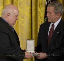 Getty Images 7 months ago US President George W  Bush  R  presents the Presidential Citizens Medal to Dr  Robert S  Martin  former director of the National Institute of Museum and