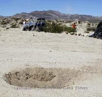 A divot left by an off road truck that went out of control running into a crowd of spectators at the California 200 Saturday night is shown Sunday  Aug  15  2010 in Lucerne Valley  Calif  The truck pinned bodies beneath it and sending others flying into a chaotic cloud of dust in a crash that killed eight people  injuring 12 authorities and witnesses said   AP Photo Alex Gallardo  2010 08 16 06 35 50  A divot left by an off road truck that went out of control running into a crowd of spectators at the California 200 Saturday night is shown Sunday  Aug  15  2010 in Lucerne Valley  Calif  The truck pinned bodies beneath it and sending others flying into a chaotic cloud of dust in a crash that killed eight people  injuring 12 authorities and witnesses said   AP Photo Alex Gallardo  2010 08 16 06 35 50