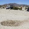 A divot left by an off road truck that went out of control running into a crowd of spectators at the California 200 Saturday night is shown Sunday  Aug  15  2010 in Lucerne Valley  Calif  The truck pinned bodies beneath it and sending others flying into a chaotic cloud of dust in a crash that killed eight people  injuring 12 authorities and witnesses said   AP Photo Alex Gallardo  2010 08 16 06 35 50  A divot left by an off road truck that went out of control running into a crowd of spectators at the California 200 Saturday night is shown Sunday  Aug  15  2010 in Lucerne Valley  Calif  The truck pinned bodies beneath it and sending others flying into a chaotic cloud of dust in a crash that killed eight people  injuring 12 authorities and witnesses said   AP Photo Alex Gallardo  2010 08 16 06 35 50