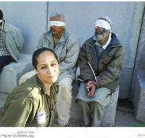 On Facebook  Israeli soldier posed with bound Arab