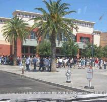 Front of the line   and back around the corner  the end   ARIZONA Tucson   a nice panoramic shot   and a shot spliced together from video   CALIFORNIA