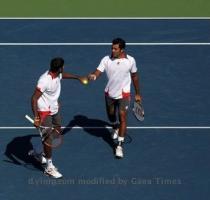 <p>Rohan Bopanna  L  of India and Aisam Ul Haq Qureshi of Pakistan play against Eduardo Schwank and Horacio Zeballos of Argentina during day ten of the 2010 US Open in New York City  Pakistan  Aisam Ul Haq Qureshi has reached the US Open men  and mixed doubles finals and hopes to win both in tribute to the 21 million flood victims in his homeland < p>