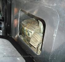 August  agents tracked down the car  looked underneath the seats and found $875 000 in cash and seven brand new semi automatic weapons  believed to be proceeds from BMF cocaine transactions  The four  innocent owners   according to Assistant U S  Attorney Robert McBurney  knew nothing  Information about the money and guns found in two  traps  was discussed this week as members of