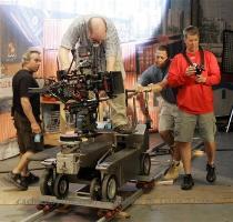 AP Photo 2 weeks ago Director of Photography Bill Wages looks through the viewfinder as he prepares to tape an