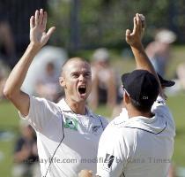 Reuters Pictures 9 months ago New Zealand s Chris Martin  L  celebrates taking the wicket of India s