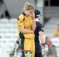 Claire Taylor hits a ball from Ellyse Perry during their ICC World Twenty20 womens  semi final match at the Oval   AP Photo  Ellyse Perry reacts after Claire Taylor scores a four from her bowling during their ICC World Twenty20 womens  semi final match at the Oval   AP Photo