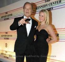 <p>Kelsey Grammar  L  and Kayte Walsh  R  arrive on the red carpet for the Kennedy Center Honors at the Kennedy Center in Washington  December 5  2010  Talk show host Oprah Winfrey  former Beatle Paul McCartney  country music legend Merle Haggard  Broadway composer and lyricist Jerry Herman of  ello Dolly  fame  and dancer choreographer director Bill T  Jones are being honored in this year  installment of the annual lifetime achievement nods