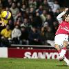 IT S ROBIN GOOD     Van Persie curls home an 83rd minute stunner to win it for the Gunners