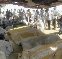 of Rajasthan on May 24  2008  The death toll from rioting by members of one of India s lowest castes jumped to 16 Saturday after they protested a government ruling on their caste status  Mourning the dead  Gujjars mourn near the bodies of community members killed during clash with policemen at Bayana village  in Rajasthan on May 24