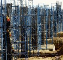 Getty Images 21 months ago Labouers work on pillers at the construction site of Delhi s Indira Gandhi International