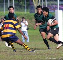 and launch any possible attack  A bad violation from the RJC camp resulted in another penalty awarded to the boys in yellow blue stripes  but this time  the kick failed to clear the posts   You re not getting past me  dude   says ACS I  s Khairulanwar  14  to RJC s Shaun Yam  11   � Leslie Tan Red Sports ACS I  had a close stab at a try when they won the ball in a line out
