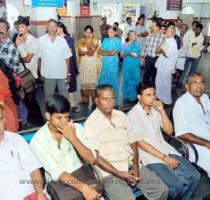 Photo  M  Govarthan Endless wait  More than 250 men and women waiting in front of the railway reservation counter at Erode to book tatkal tickets to Chennai