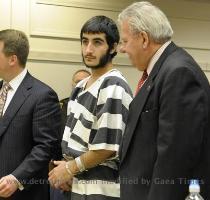 Ihab Maslamani  center  in court last Thursday for the preliminary hearing on charges stemming from the Aug  9 disappearance and death of Matthew Landry of Chesterfield Township   Charles V