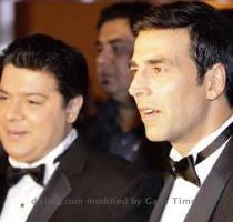 <p>Zee Cine Awards hosts actor Akshay Kumar  R  and director Sajid Khan pose on the red carpet of the bollywood Zee Cine Awards at the Marina Bay Sands in Singapore January 14  2011